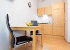 Galley kitchen with dining area